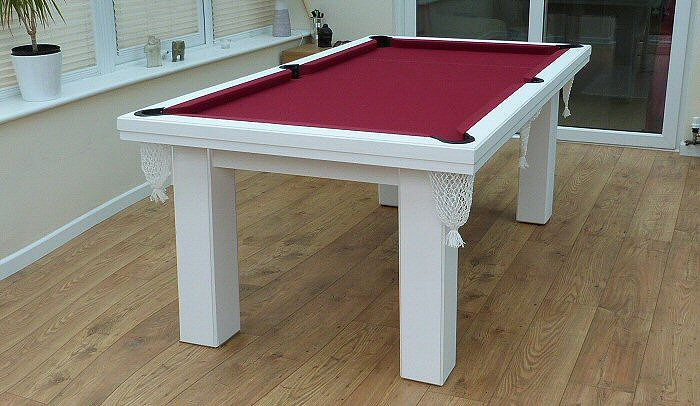  white pool table with deep nets