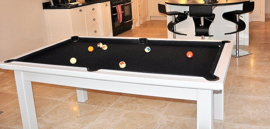 white kitchen pool table with black cloth 
